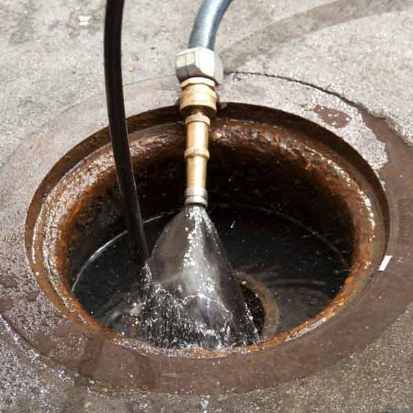 Domestic sewer pipe junction before cleaning